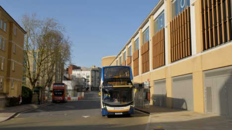 Tracking-Shot-of-Bus-Driving-Past-Westgate-Shopping-Centre-On-Castle-Street